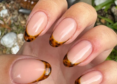 Elegant tortoise shell manicure by Myas Manicures in Cromwell, Otago, NZ, highlighting trendy nail art.
