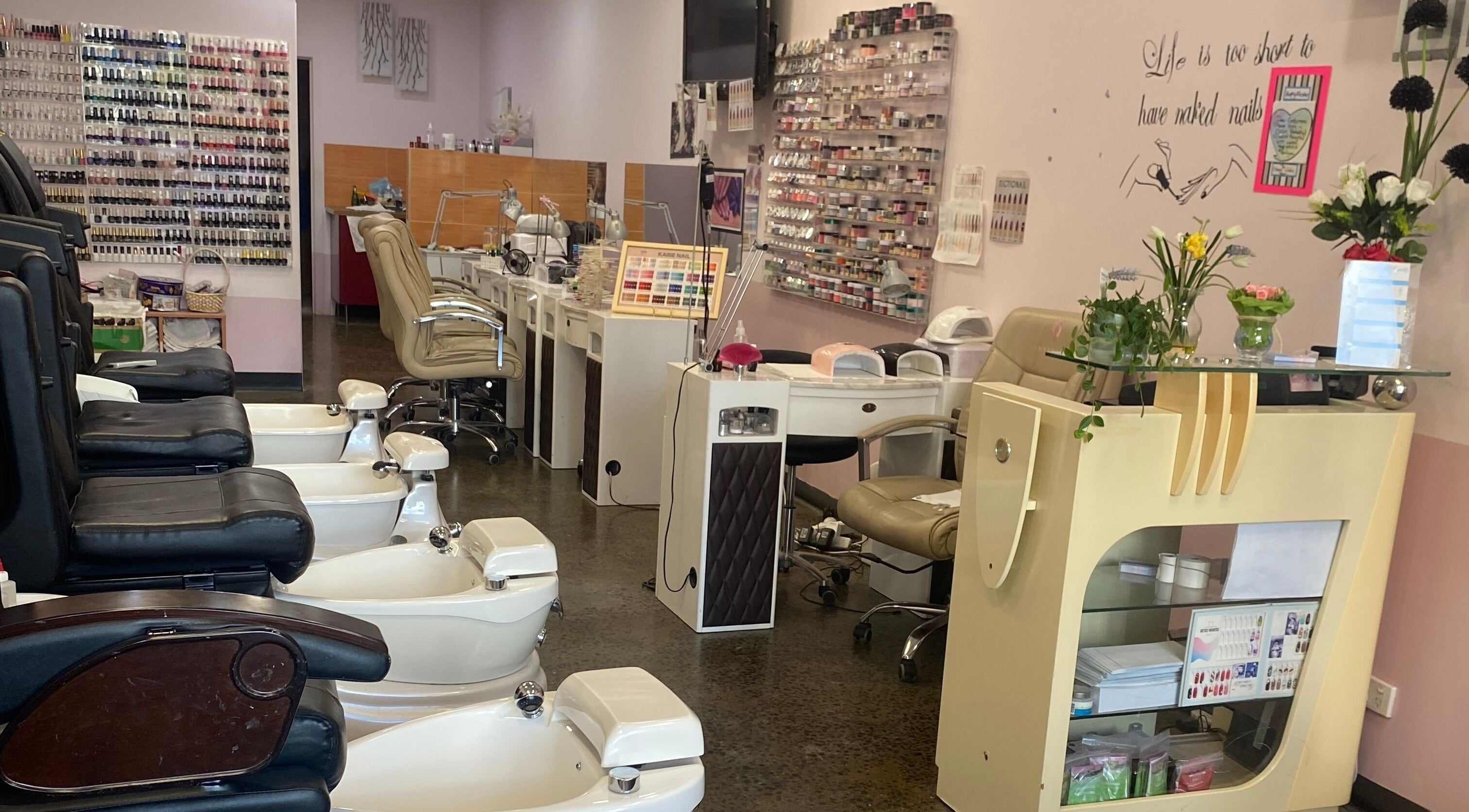 Elegant interior of Ocean Nails & Beauty in Melbourne, Victoria, AU showcasing pedicure and manicure stations.