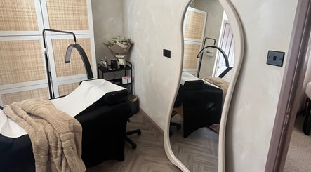 Luxurious treatment room at Jordon at Amica Hair & Beauty, Thirsk, England, GB, with elegant decor and ambient lighting.