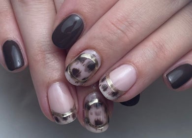 Elegant nail art with dark and patterned designs at Jordon at Amica Hair & Beauty, Thirsk, England, GB.