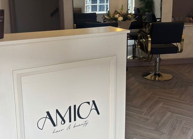 Reception area at Jordon at Amica Hair & Beauty in Thirsk, England, GB with stylish decor and salon chairs.