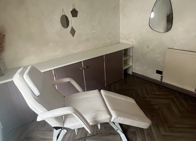 Relaxing treatment room at Jordon at Amica Hair & Beauty, Thirsk, England, GB, featuring a plush white chair.