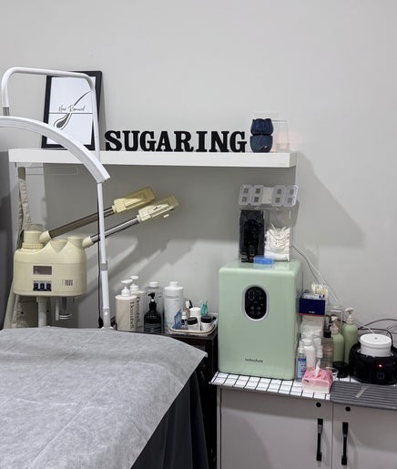 Sugaring Beaute Studio's serene room in Johor Bahru, Johor Darul Ta'zim, MY, with a cozy massage table.