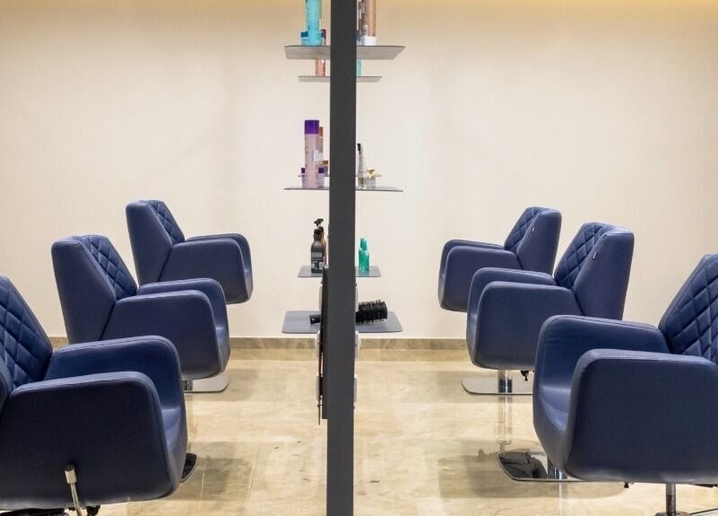 Modern blue salon chairs at Eklipz Ladies Salon - Rajkot, Rajkot, Gujarat, IN, showcasing stylish interior.