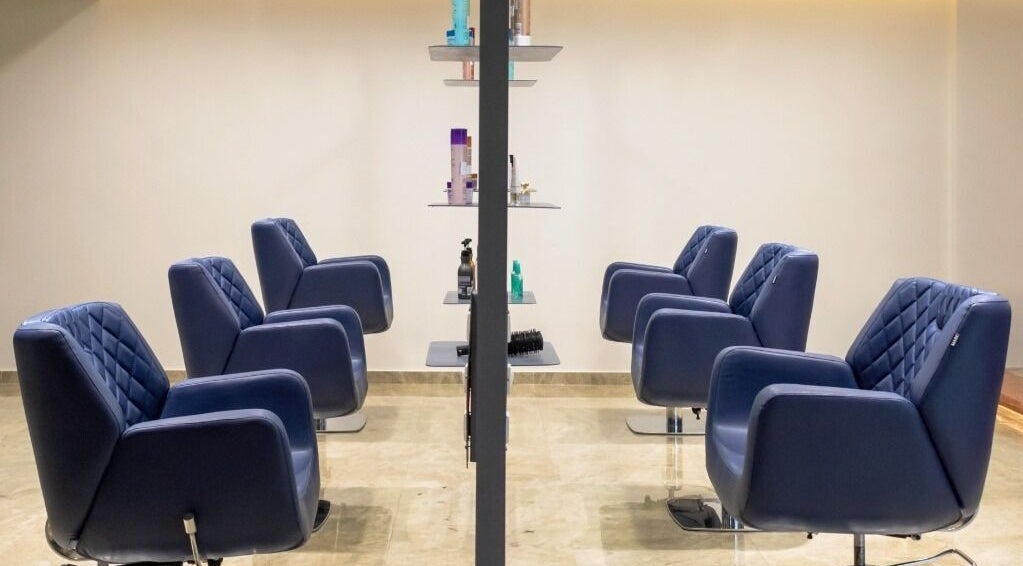 Modern blue salon chairs at Eklipz Ladies Salon - Rajkot, Rajkot, Gujarat, IN, showcasing stylish interior.
