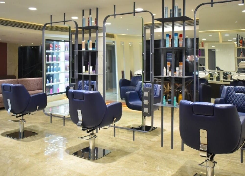 Chic interior of Eklipz Ladies Salon - Rajkot with stylish seating and mirrors. Located in Rajkot, Gujarat, IN.
