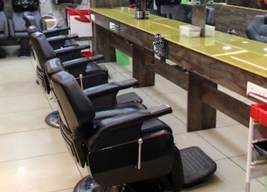 Chic barber chairs at Eklipz Men's Salon - Rajkot, Rajkot, Gujarat, IN, ready for a premium grooming session.