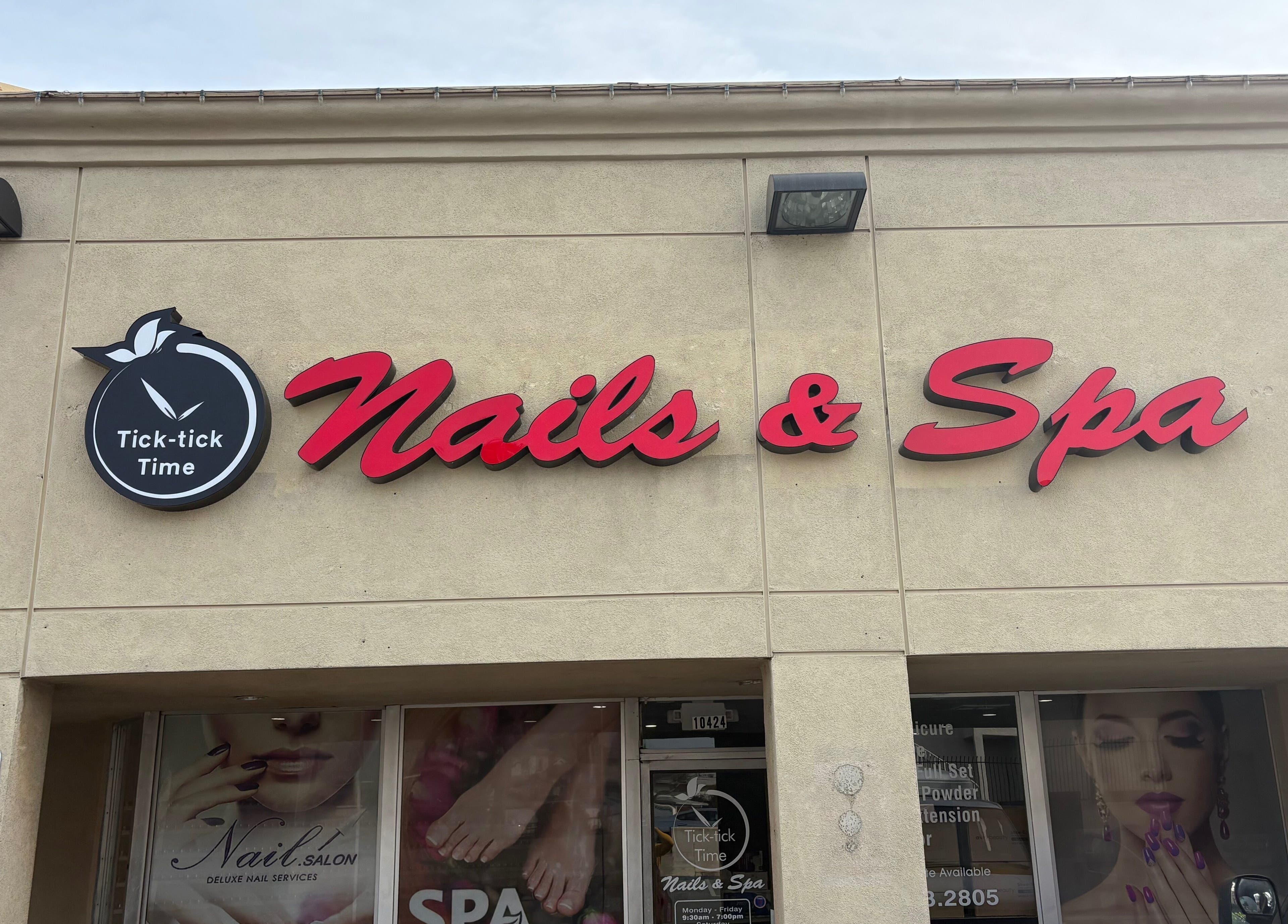 Front view of Express Tick Tick Time Nails and Spa in El Monte, California, US with signage.