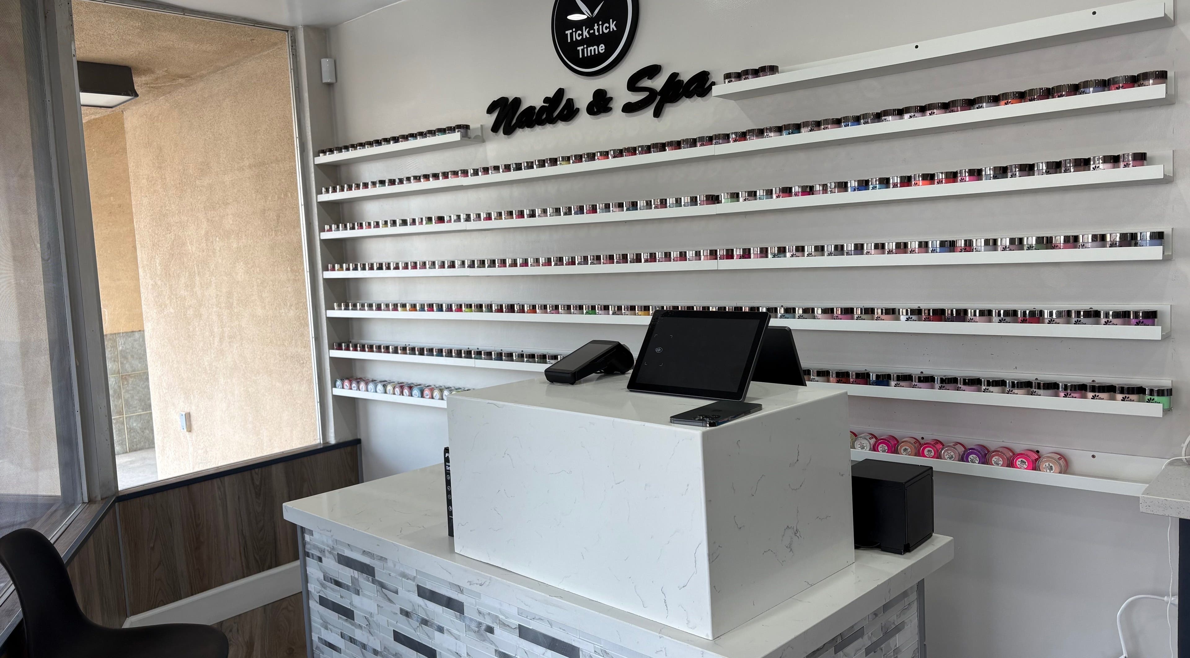Chic nail polish display at Express Tick Tick Time Nails and Spa, El Monte, California, US.