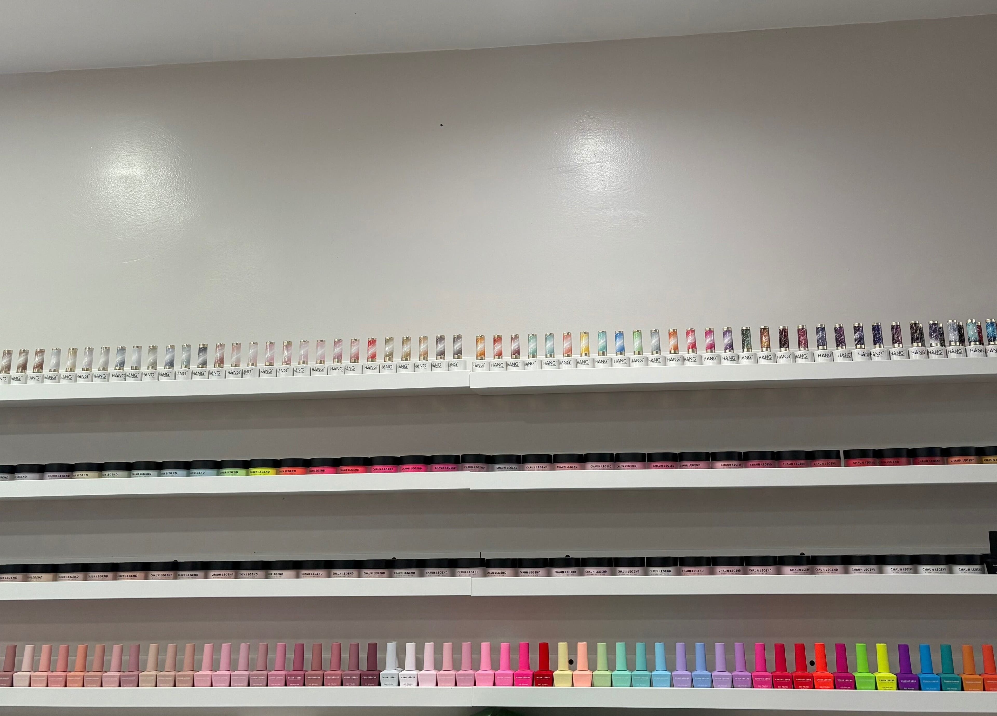 Colorful nail polish selection at Express Tick Tick Time Nails and Spa in El Monte, California, US.