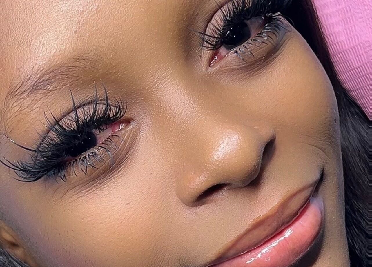 Close-up of expertly applied eyelash extensions at Kim The Beautician, Kingston, St. Andrew Parish, JM.