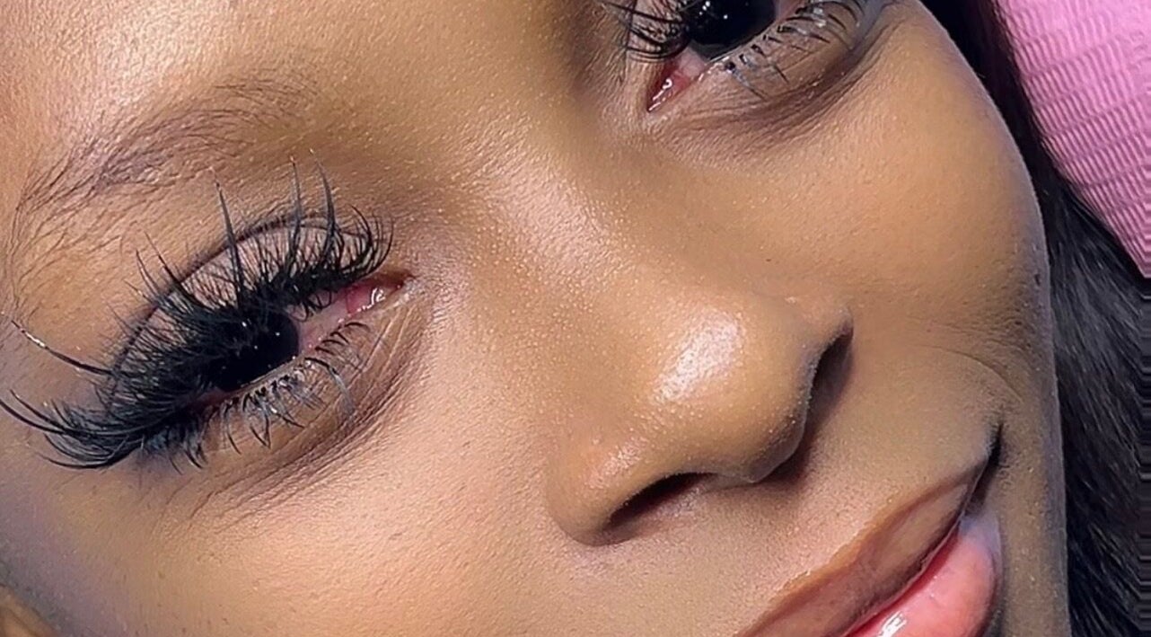Close-up of expertly applied eyelash extensions at Kim The Beautician, Kingston, St. Andrew Parish, JM.