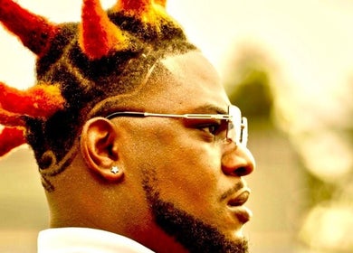 Bold, colorful hairstyle showcasing creativity at FadedT0Glory, Kennewick, Washington, US.