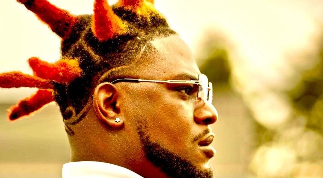 Bold, colorful hairstyle showcasing creativity at FadedT0Glory, Kennewick, Washington, US.