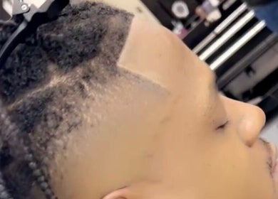 Fresh fade haircut at FadedT0Glory, Kennewick, Washington, US, showcasing skillful styling.