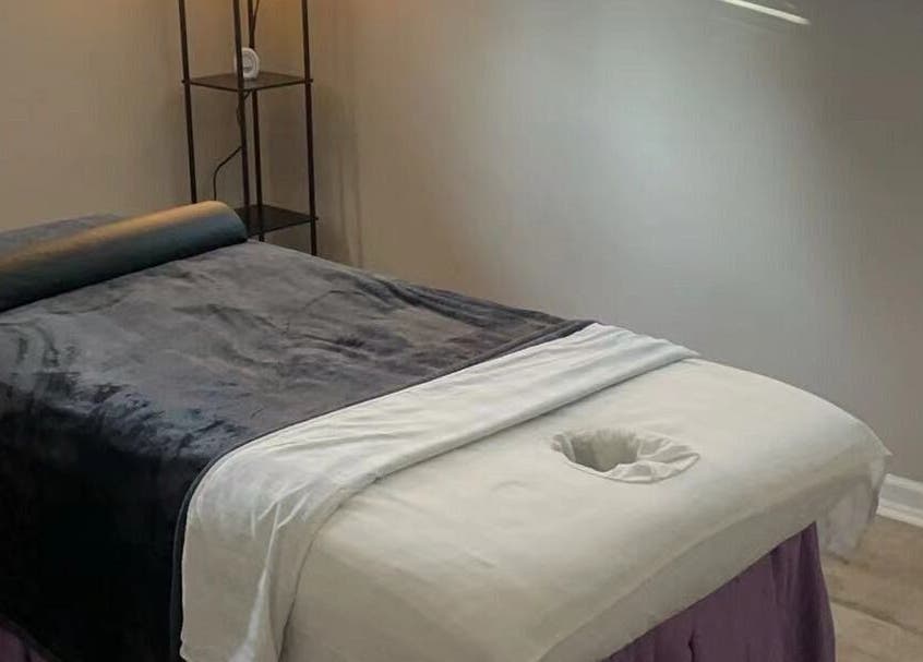 Tranquil massage table setup at S&C Wellness Spa, Everett, Washington, US, enhancing relaxation and comfort.