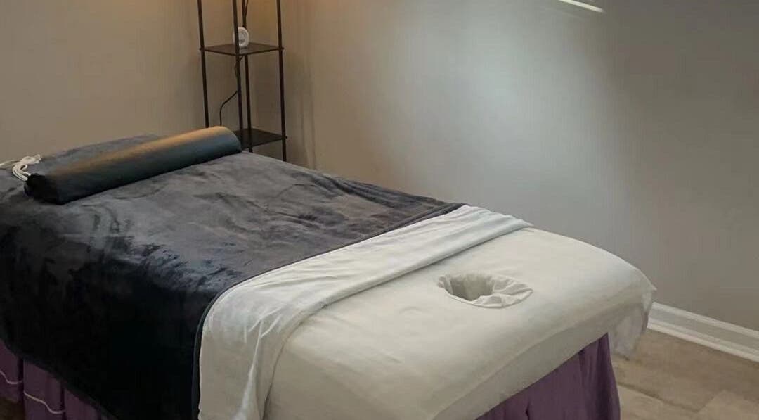 Tranquil massage table setup at S&C Wellness Spa, Everett, Washington, US, enhancing relaxation and comfort.