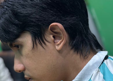 Close-up of a fresh haircut at SNEAKYSNIPS BARBERSHOP in Johor Bahru, Johor Darul Ta'zim, MY.