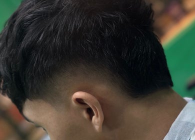 Close-up of a fresh fade haircut at SNEAKYSNIPS BARBERSHOP, Johor Bahru, Johor Darul Ta'zim, MY.
