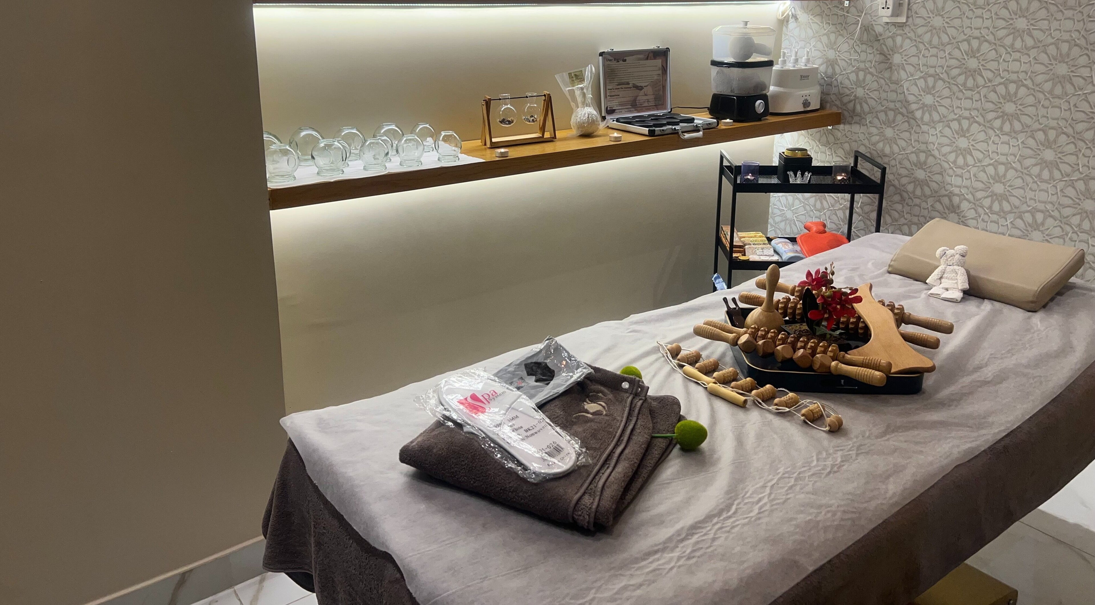 Relaxing massage room at Wejdan Aljamal Beauty Salon, Dhahran, Eastern Province, SA with soothing decor.