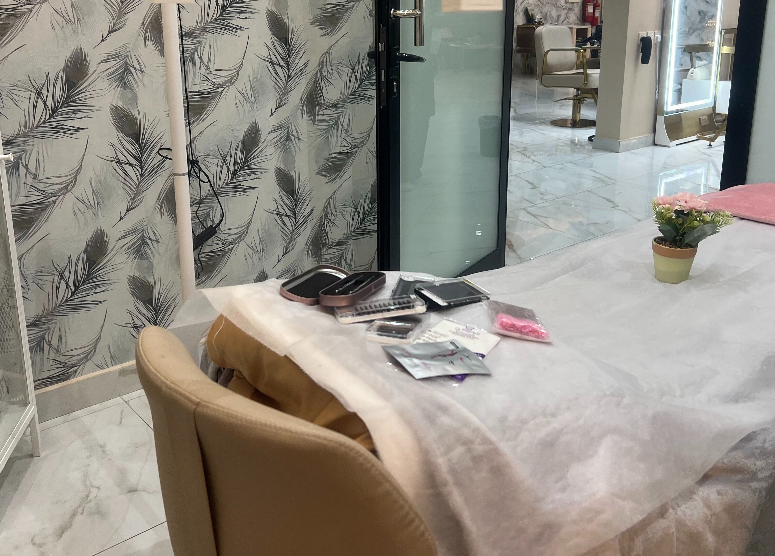 Well-appointed treatment room at Wejdan Aljamal Beauty Salon, Dhahran, Eastern Province, SA, featuring stylish decor.