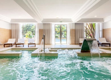 Luxurious indoor spa pool at Spa Viva Cala Mesquida Suites & Spa, Cala Mesquida, Illes Balears, ES.