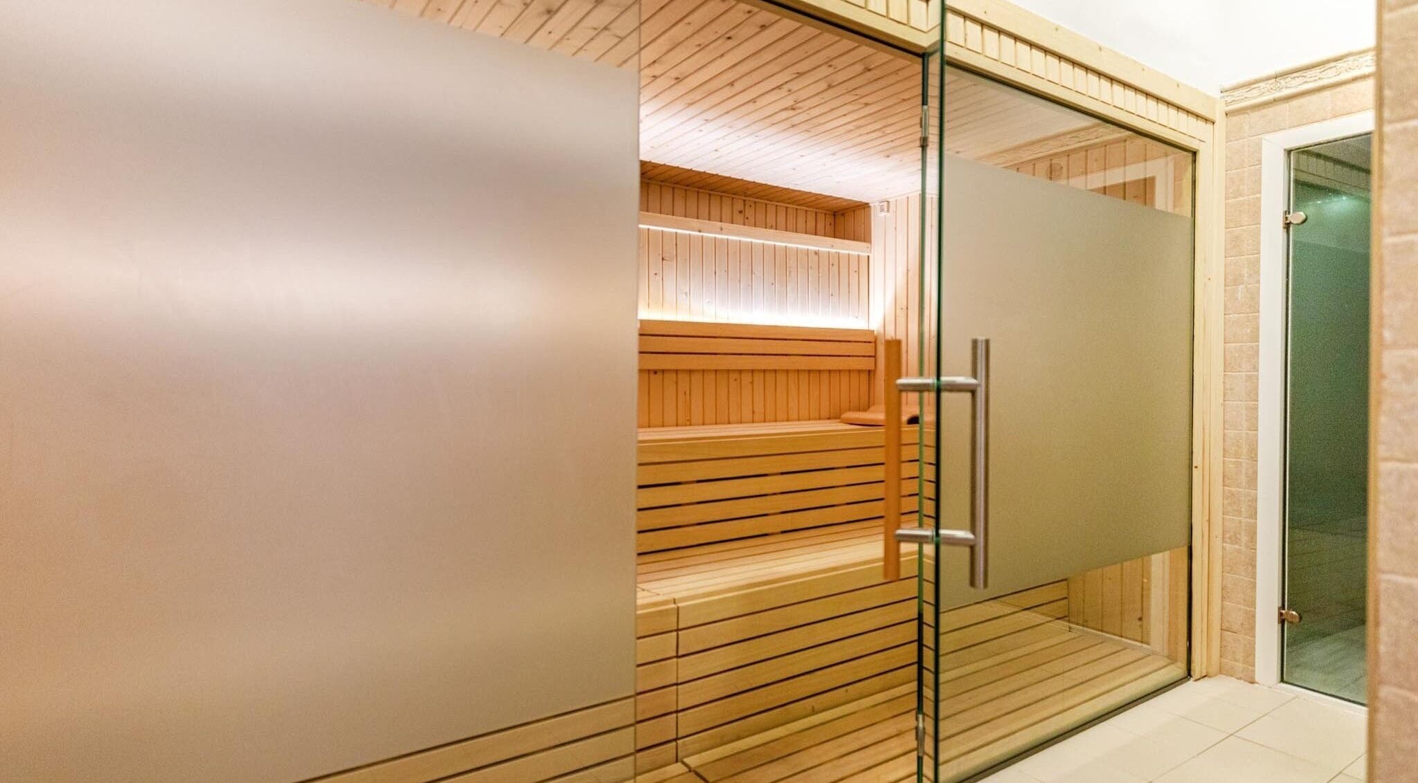 Luxurious sauna at Spa Viva Cala Mesquida Suites in Cala Mesquida, Illes Balears, ES offers a tranquil retreat.