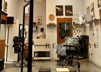 Inside Rey Kimber Barbershop, Bali, Bali, ID, showcasing a stylish and inviting barber chair setup.