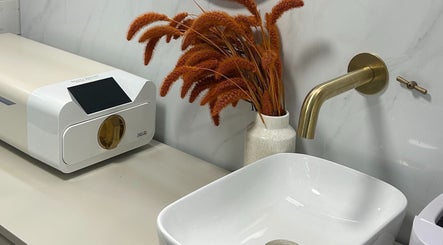 Modern sink and decor at PediHealth + The Foot Clinic in Lancing, England, GB.