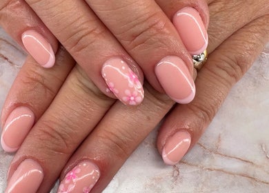 Elegant pink floral manicure at Belle Luxe Beauty, Crowthorne, England, GB.