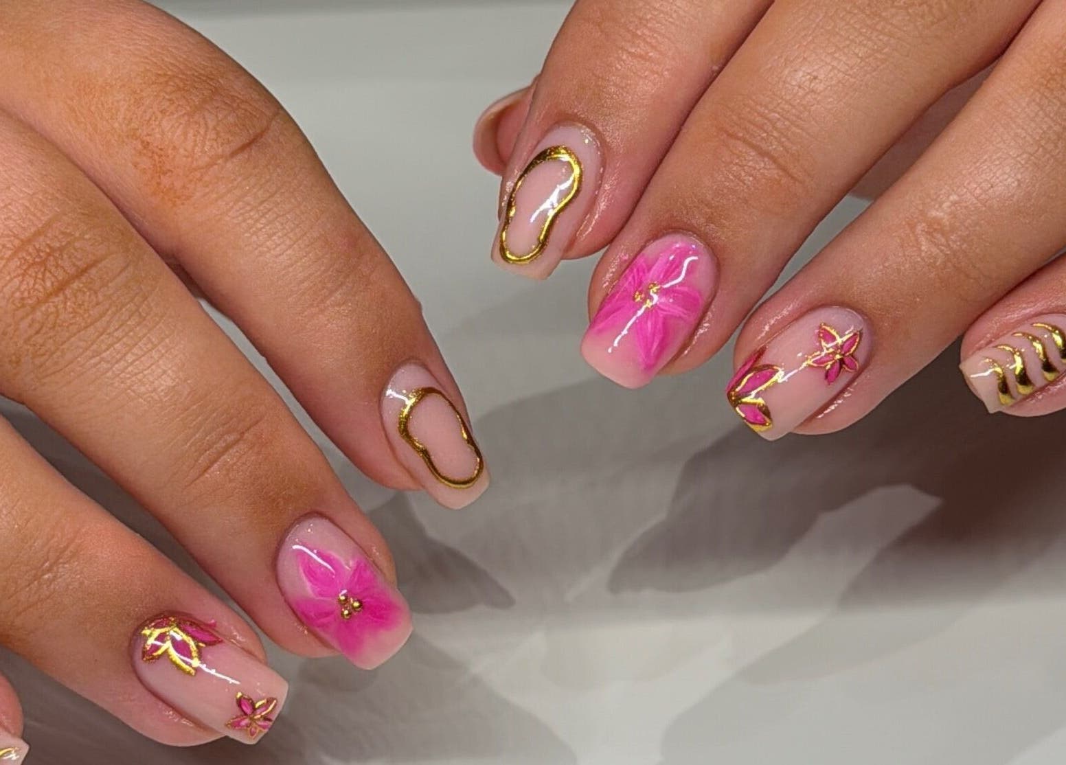Elegant pink and gold nail art at Nails By Alice B - Newcastle in Stoke-on-Trent, England, GB.