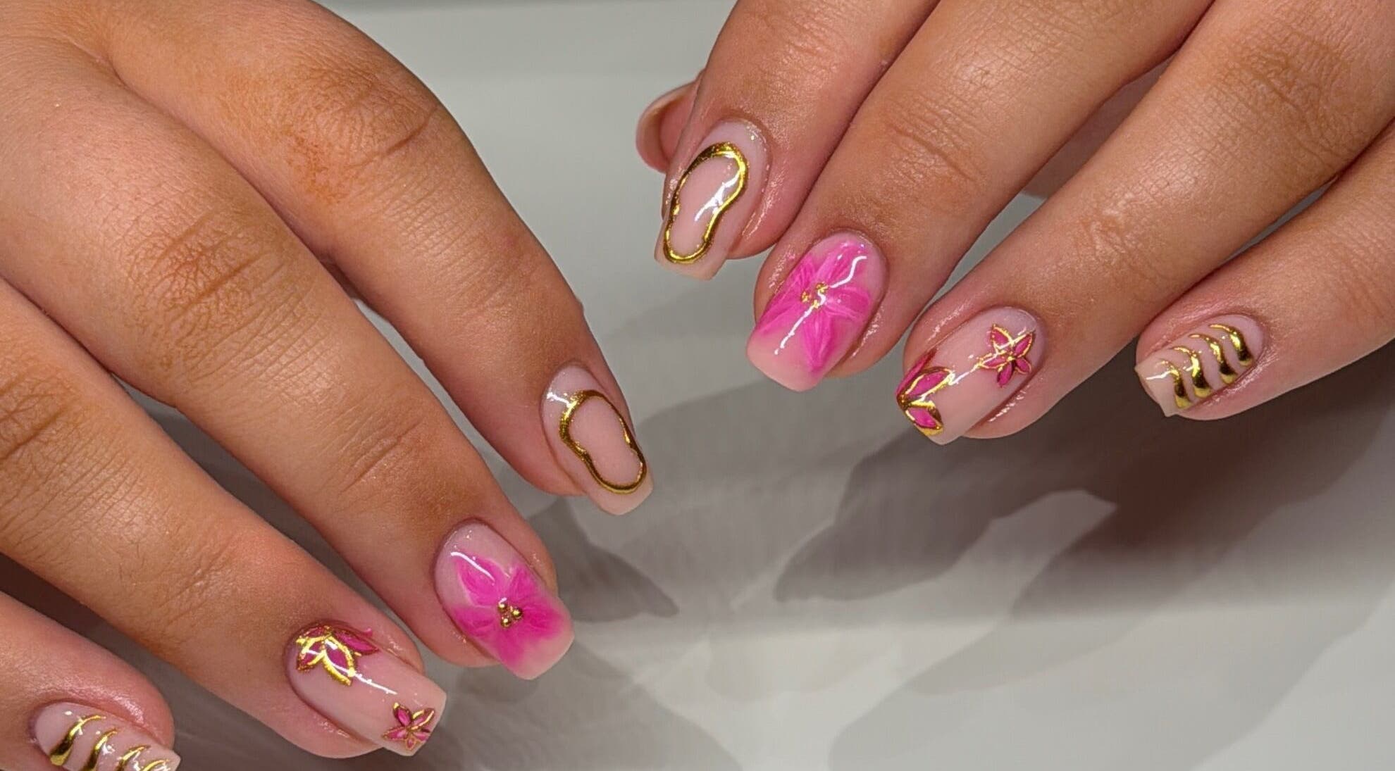 Elegant pink and gold nail art at Nails By Alice B - Newcastle in Stoke-on-Trent, England, GB.