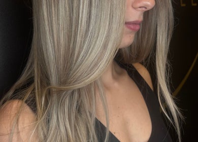 Blonde hair styled at Brianne Rae Styles in Smithtown, New York, US, showcasing a sleek, elegant finish.