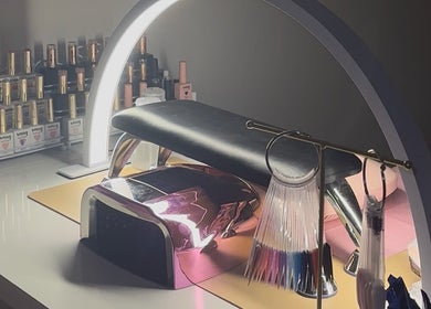 Modern nail station at Buttercup Nails, North Lakes, Queensland, AU featuring tools and nail polishes.