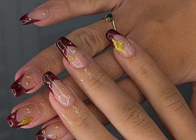 Elegant nail art with golden accents at Buttercup Nails, North Lakes, Queensland, AU.