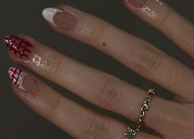 Stylish nail design with red plaid and white tips at Buttercup Nails, North Lakes, Queensland, AU.