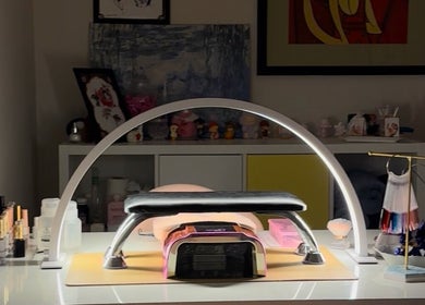 Modern nail station setup at Buttercup Nails in North Lakes, Queensland, AU with polishes and decor.