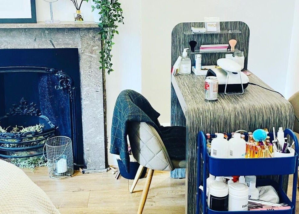 The Lavender Lounge's elegant beauty setup in Carlton In Lindrick, England, GB with a stylish fireplace.