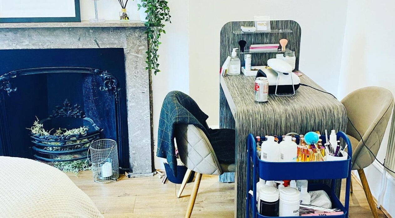 The Lavender Lounge's elegant beauty setup in Carlton In Lindrick, England, GB with a stylish fireplace.