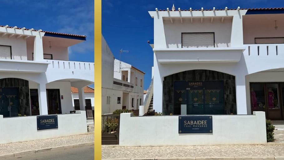 Entrance of Sabaidee Thai Massage Sagres, a serene massage venue in Sagres, Faro, PT under a clear blue sky.
