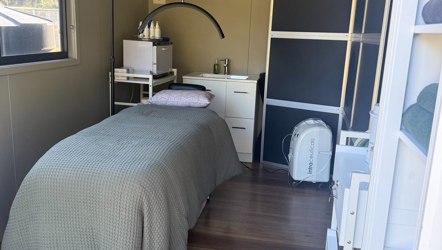 Relaxing treatment room at Always Natural Beauty, Longford, Victoria, AU, featuring a cozy bed and modern amenities.
