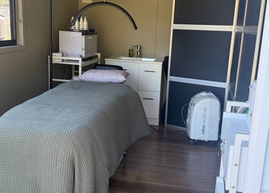 Relaxing treatment room at Always Natural Beauty, Longford, Victoria, AU, featuring a cozy bed and modern amenities.
