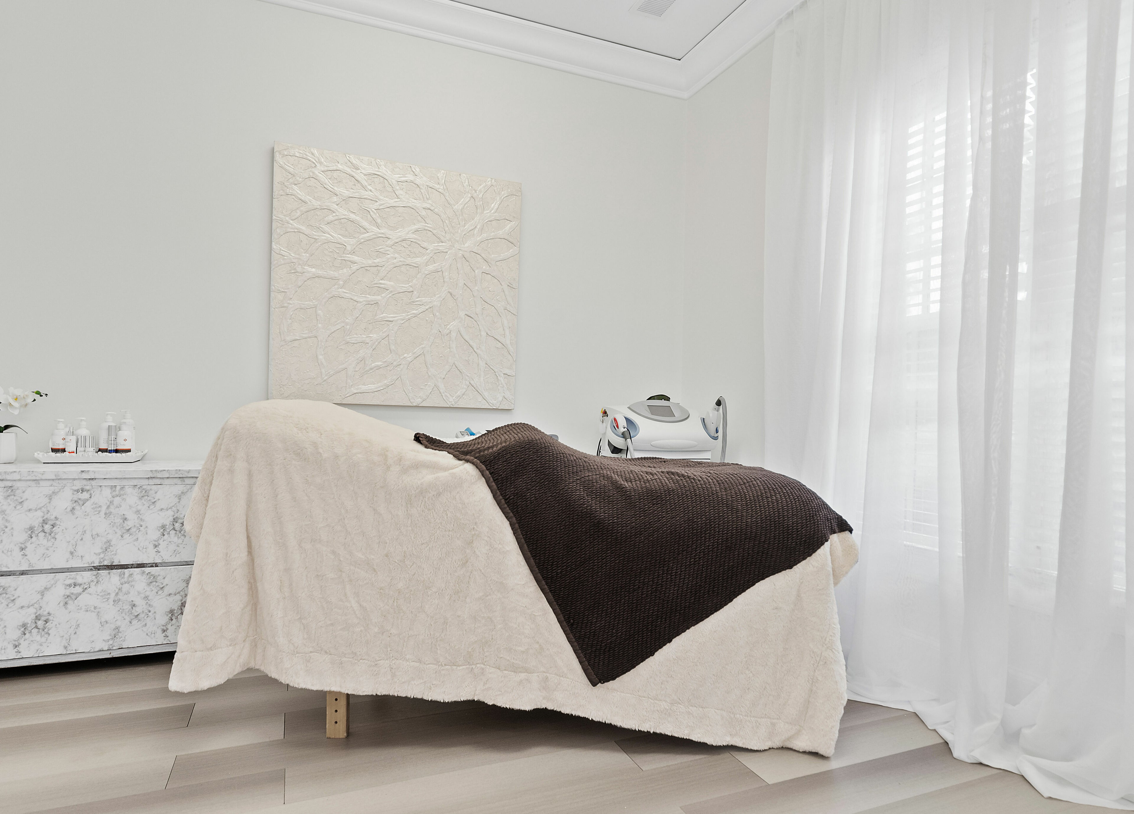 Serene spa room at ReVive Spa Charlotte with a massage table and calming decor in Charlotte, North Carolina, US.