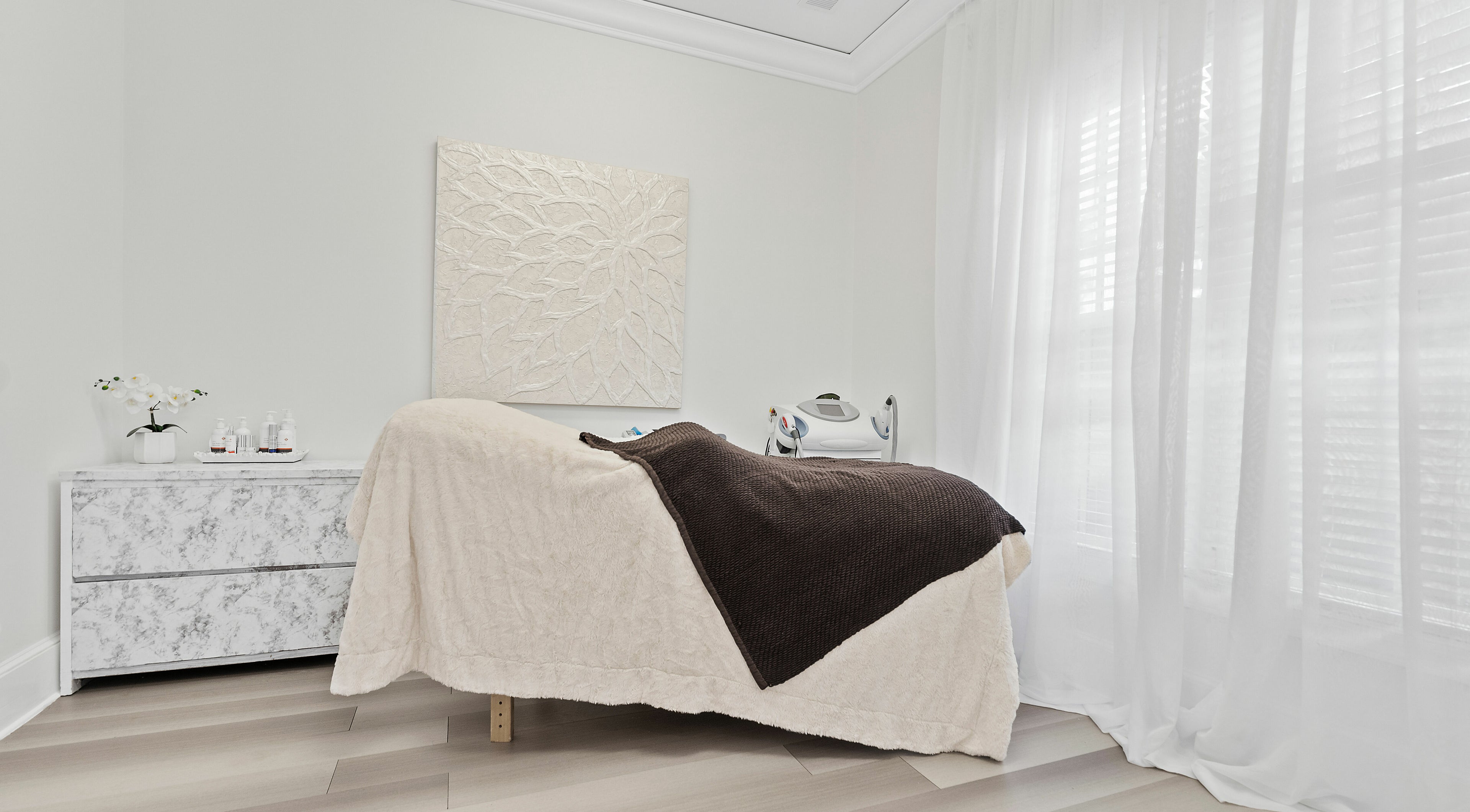 Serene spa room at ReVive Spa Charlotte with a massage table and calming decor in Charlotte, North Carolina, US.