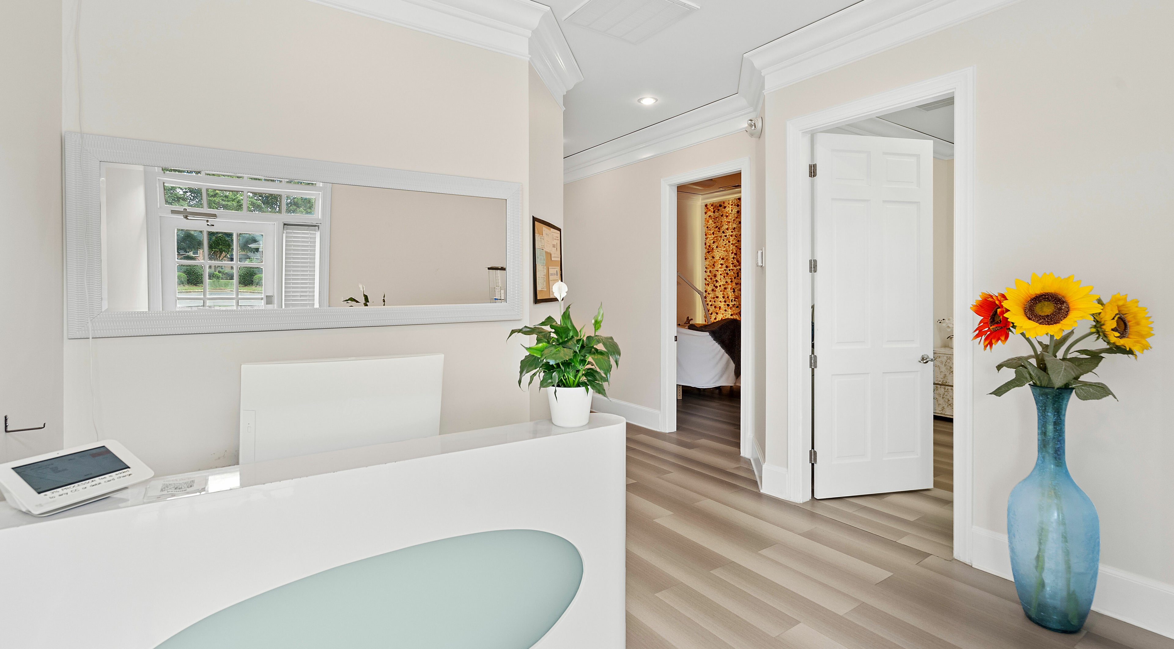 Warm welcome at ReVive Spa Charlotte's modern reception in Charlotte, North Carolina, US.