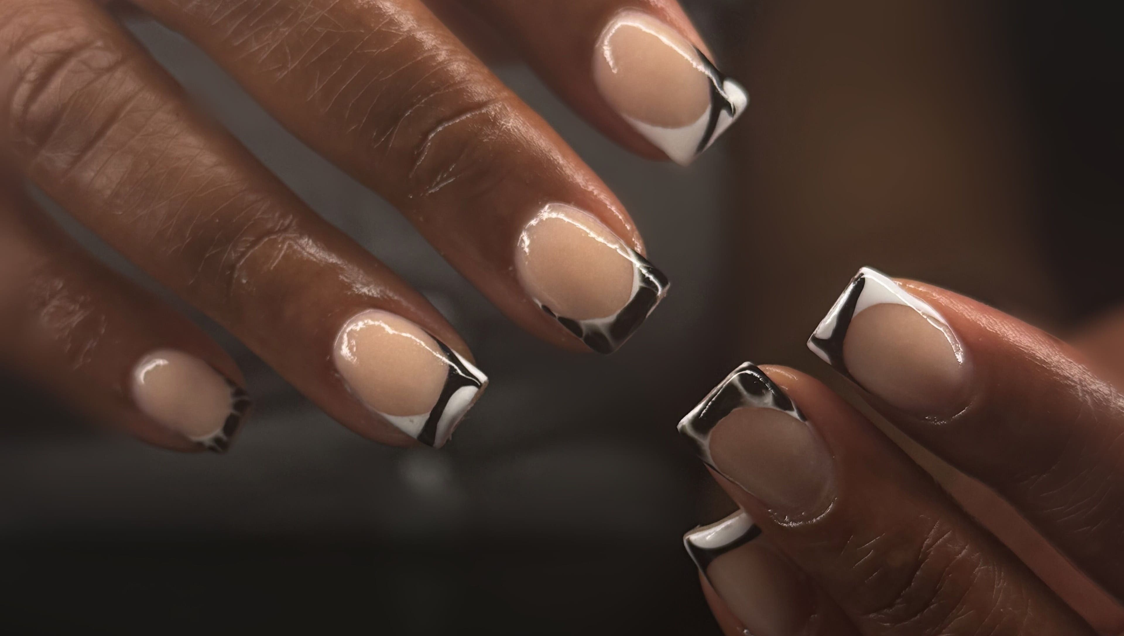 Stylish nail art at Hart of Nails in Fayetteville, North Carolina, US emphasizing chic elegance.
