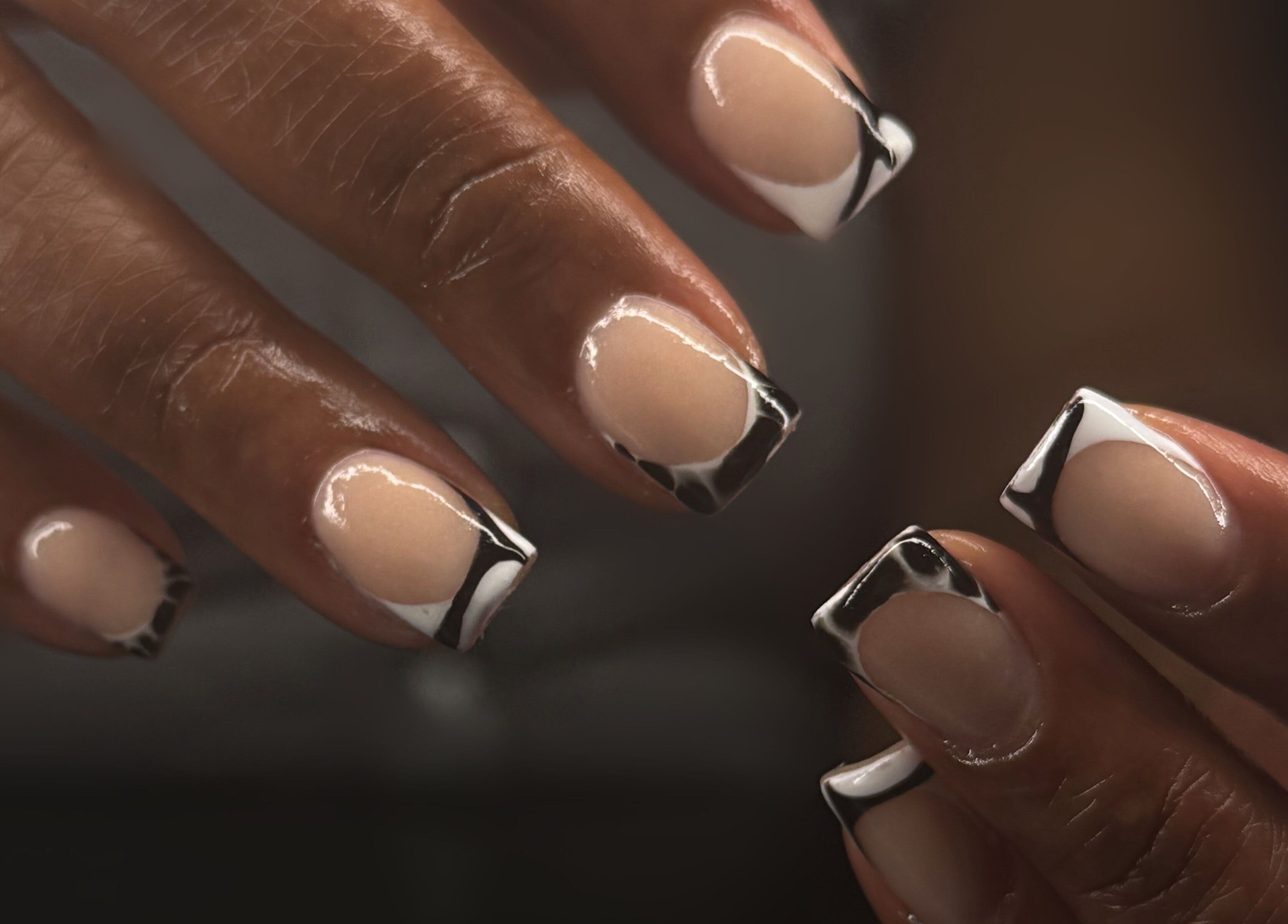 Stylish nail art at Hart of Nails in Fayetteville, North Carolina, US emphasizing chic elegance.