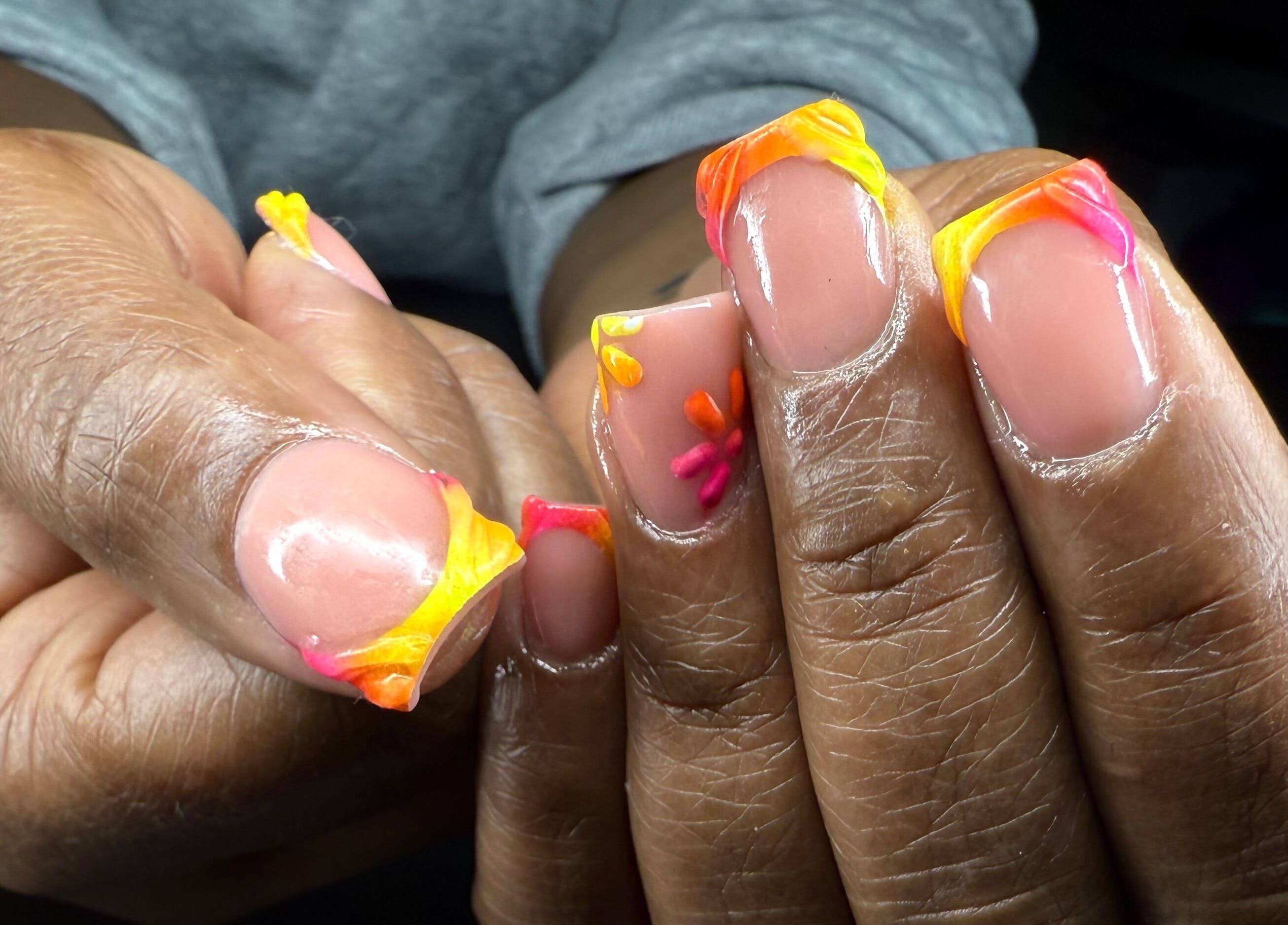 Colorful nail design at Hart of Nails, Fayetteville, North Carolina, US.