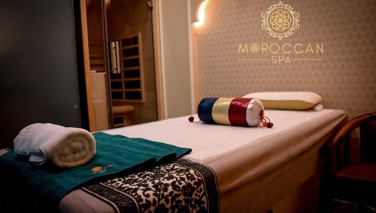 Relaxing spa treatment room at Moroccan Spa, Lucknow, Uttar Pradesh, IN with massage table and ambient lighting.