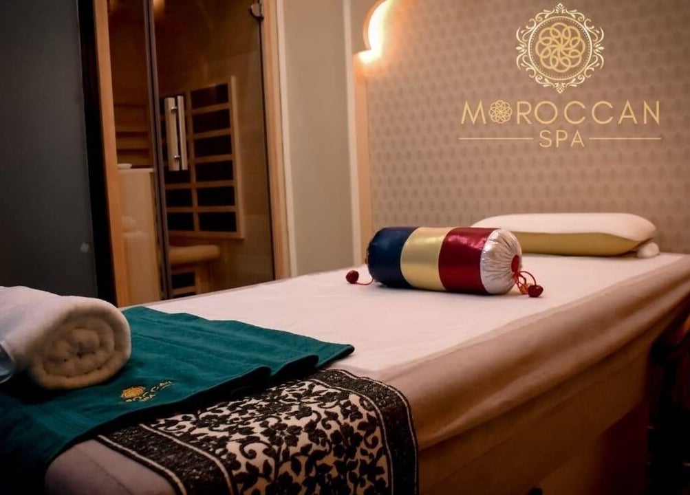 Relaxing spa treatment room at Moroccan Spa, Lucknow, Uttar Pradesh, IN with massage table and ambient lighting.